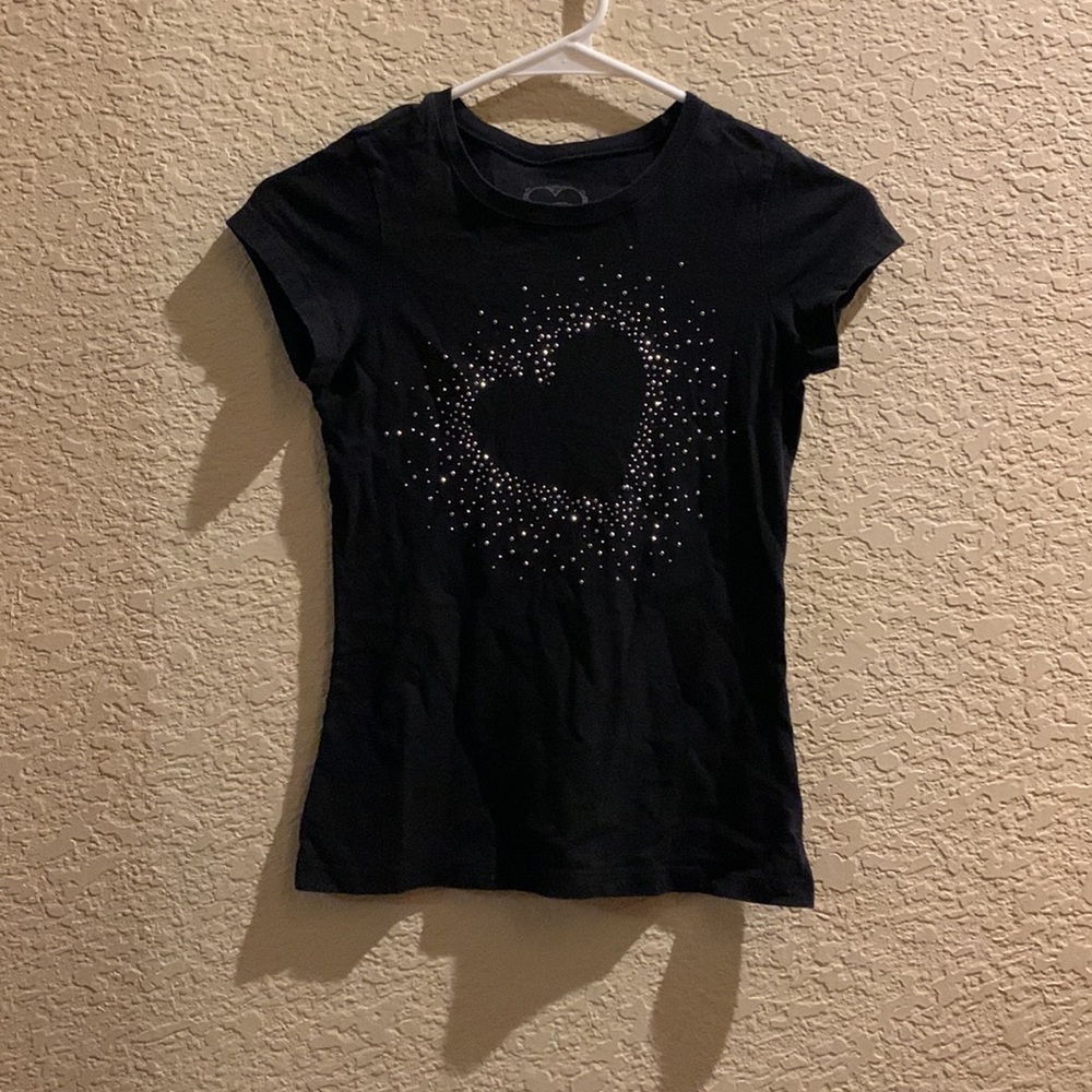 A cute top in the brand first love